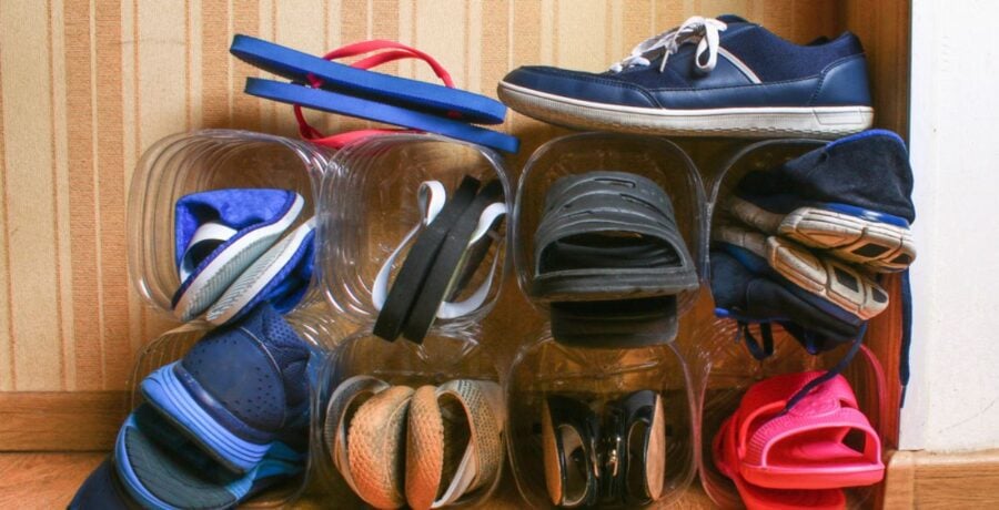 Shoes stored in plastic bottles cut to size